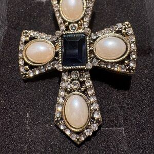 Elegant Black and Cream Cross Pendant